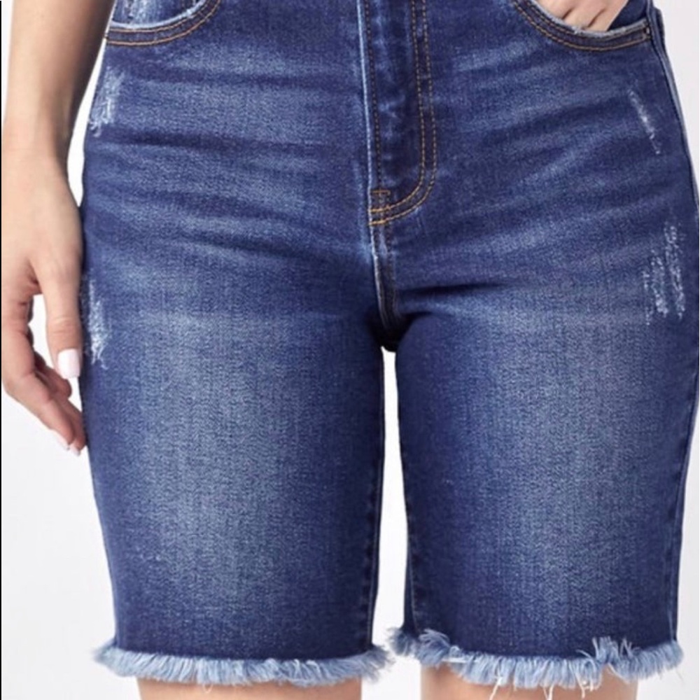 Women Bermuda Denim Shorts. Dark denim with fray hem